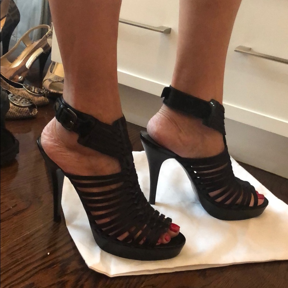 Stuart Weitzman Black platform sandals.